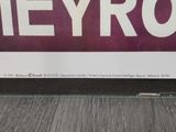a sign that says heyro on the side of a building
