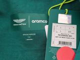 an image of a green t - shirt with a name tag attached to it