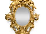 an image of a gold mirror with cherenshes and cherenshes on it
