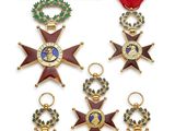 quatre médailles et un ruban orné d'une étoile