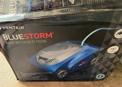 a box with a blue storm in it on the floor