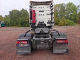 a truck that is parked in the dirt