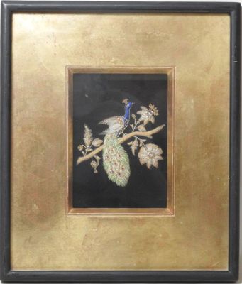 painting of a peacock sitting on a branch in a gold frame