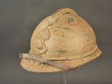 a helmet on a stand on a gray background