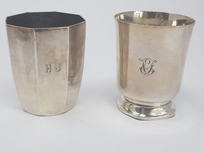 pair of silverplated cups with monogrammed initials on them