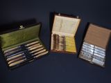 three different types of pens in a case on a table