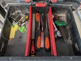 a tool box with tools in it on the floor