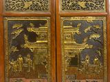 pair of antique chinese carved wood panels with gold leaf designs