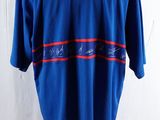 a close up of a blue shirt on a mannequin stand