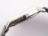an image of a close up of a watch on a white surface