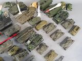 a lot of military toys that are on a table