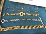many different types of bracelets on the table