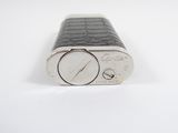 an image of a lighter that is sitting on a table