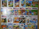 de nombreux albums de bandes dessinées exposés sur le mur