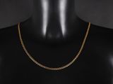 un collier à chaîne en or sur un mannequin mannequin mannequin mannequin mannequin mannequin mannequin mannequin mannequin mannequin