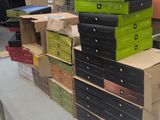 many boxes stacked on top of each other on a table