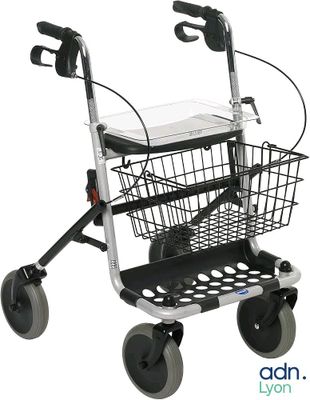 a close up of a walker with a basket on the back
