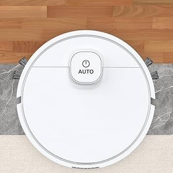 vue aérienne d'un aspirateur robot sur un parquet