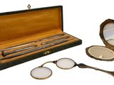 a box with a pair of glasses and a pair of glasses in it