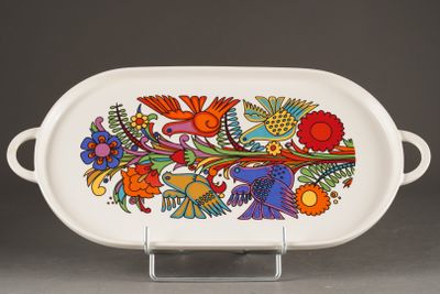 an image of a white serving dish with colorful flowers on it