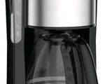 black and silver coffee maker sitting on top of a white counter