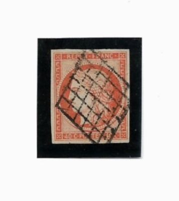 un vieux timbre sur lequel figure une carte