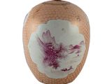 a vase that has a picture of a bird on it