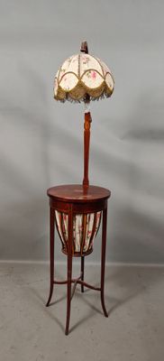 an image of a table with a lamp on top of it
