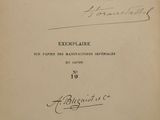 an old black and white photo of a book with a handwritten title