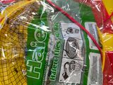 a plastic bag with a tennis racket inside of it