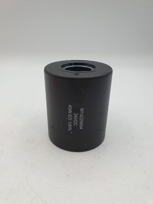 un gros plan d'un petit objet noir sur une surface blanche