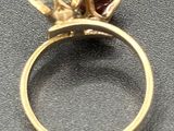 an image of a close up of a ring on a table