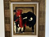 a picture of a painting of a bull on a easel