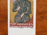 une image d'un timbre représentant une femme tenant une épée