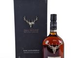 a bottle of dalmore single malt whisky next to a black box