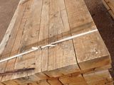 several pieces of wood are stacked on top of each other