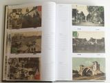 an open book with pictures of buildings and a bridge in it