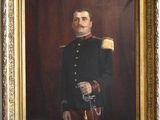 portrait d'un homme en uniforme militaire dans un cadre doré