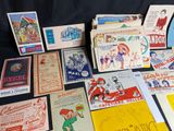 many different types of cards and postcards laid out on a table