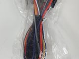 a close up of a cable in a plastic bag on a white surface