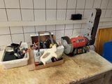 a box of tools sitting on a counter in a kitchen