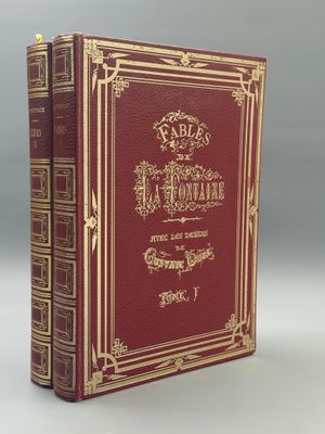 un livre rouge avec des bordures dorées et une bordure dorée sur la couverture