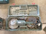 a tool box with tools in it sitting on the floor