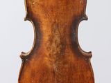 an old violin with a wooden back and a long neck