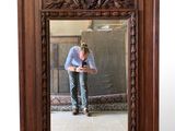 a man taking a picture of himself in a mirror