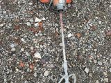 an orange and white fire hydrant laying on the ground