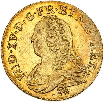 une pièce d'or sur laquelle figure le portrait d'un homme de profil