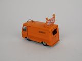 an orange toy truck with a flag on top of it