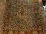 a large rug on the floor in a living room