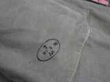 a close up of a piece of clothing with a tag on it